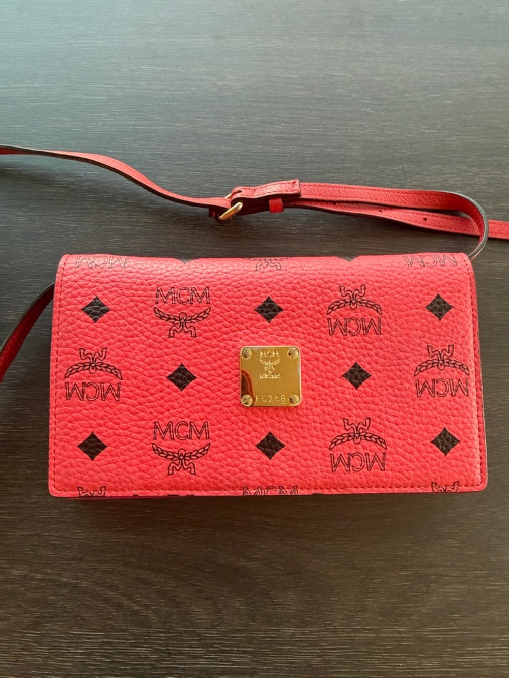 MCM Red Logo Crossbody Wallet with Gold Plaque
Authentic